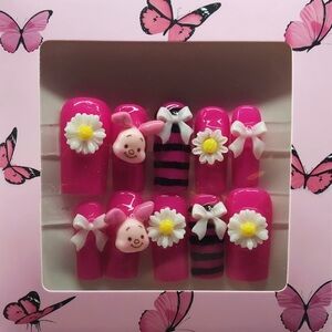 Pink Nail Art Set with Floral and piglet accents!